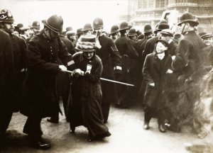 A Suffragette struggling with a policeman on Black Friday 18 November 1910.  (Museum of London Prints) 